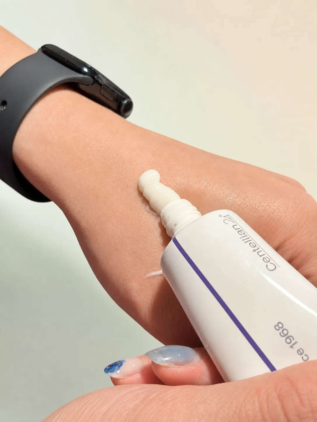A dollop of Madeca Cream dispensed onto the back of a hand, showing its thick-but-light consistency