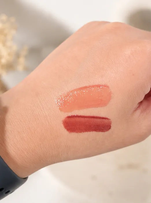 Fresh glossy swatch on top compared with the deeper, matte tint it sets into below
