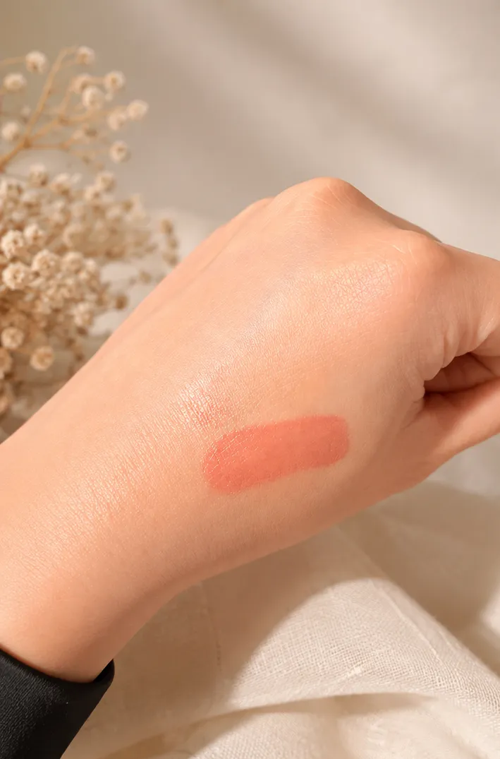 The tint left behind on skin once the gloss layer has fully faded